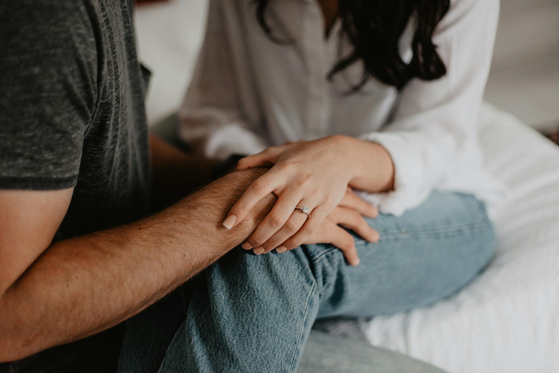 Woman holding man's hand | Source: Pexels