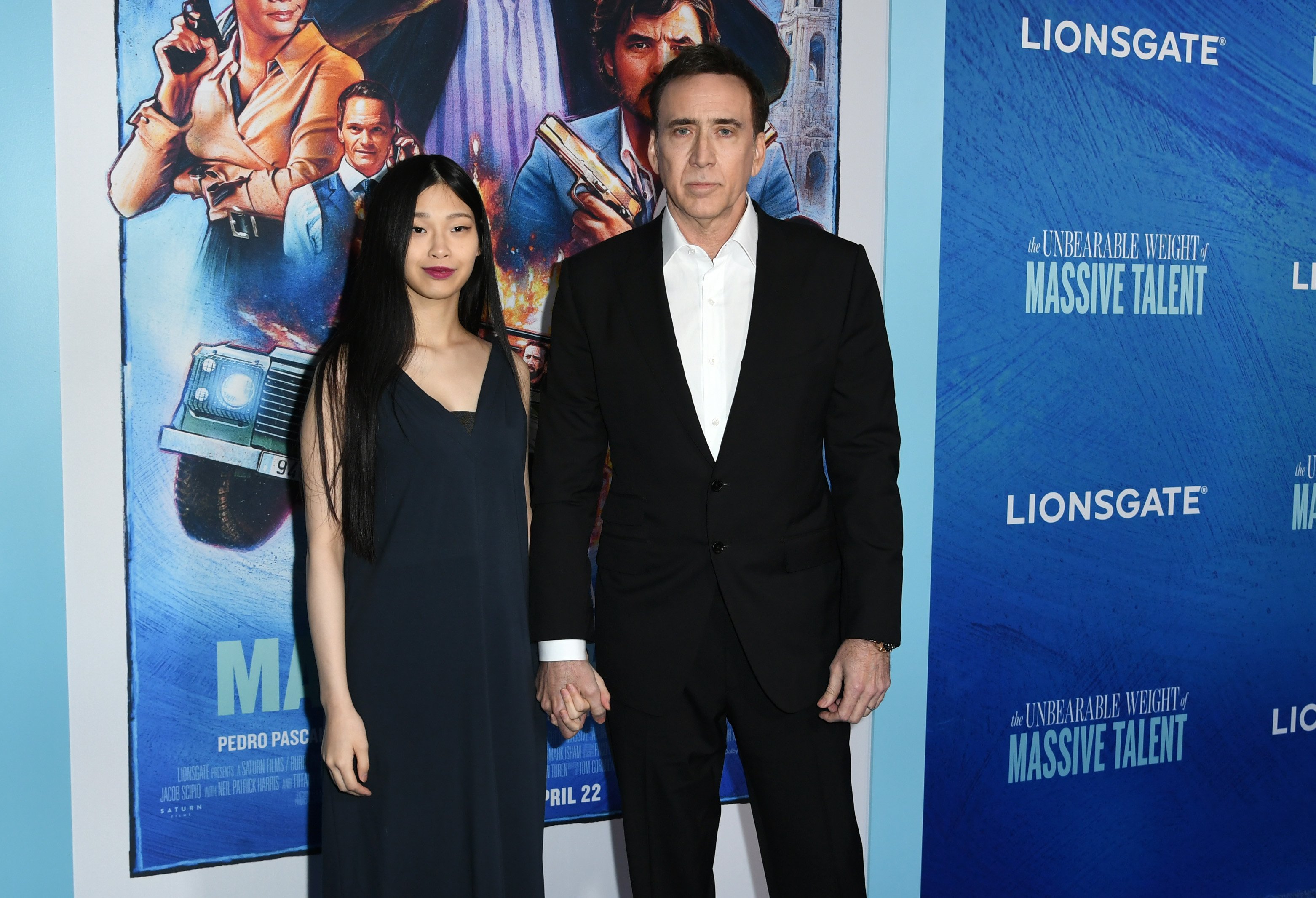Riko Shibata and Nicolas Cage attend the Los Angeles special screening of "The Unbearable Weight of Massive Talent" at DGA Theater Complex on April 18, 2022 in Los Angeles, California. | Source: Getty Images