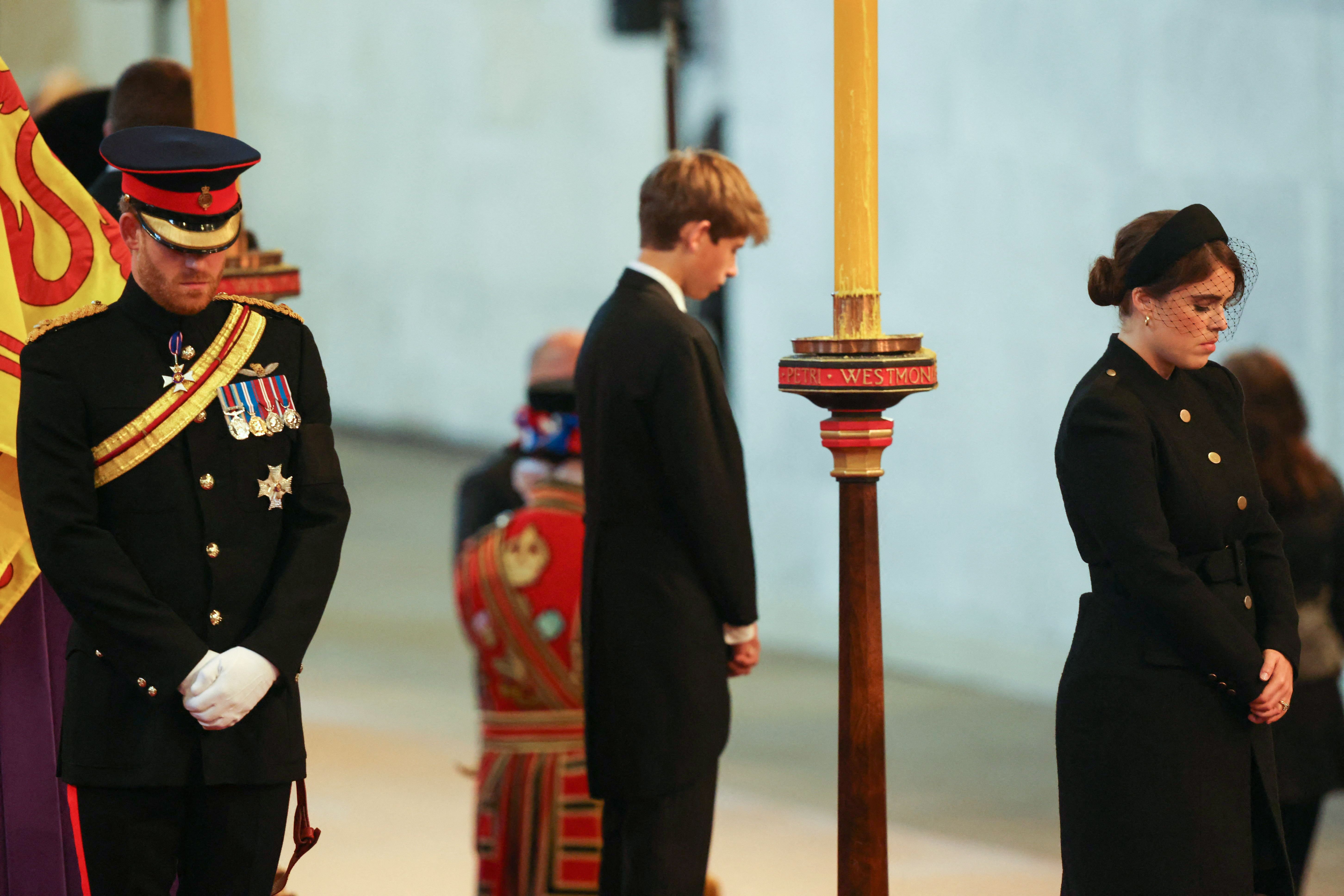 Prince Harry, James, Viscount Severn, and Princess Eugenie mount a vigil around the coffin of Queen Elizabeth II, lying in state on the catafalque in Westminster Hall, at the Palace of Westminster on September 16, 2022 in London | Source: Getty Images