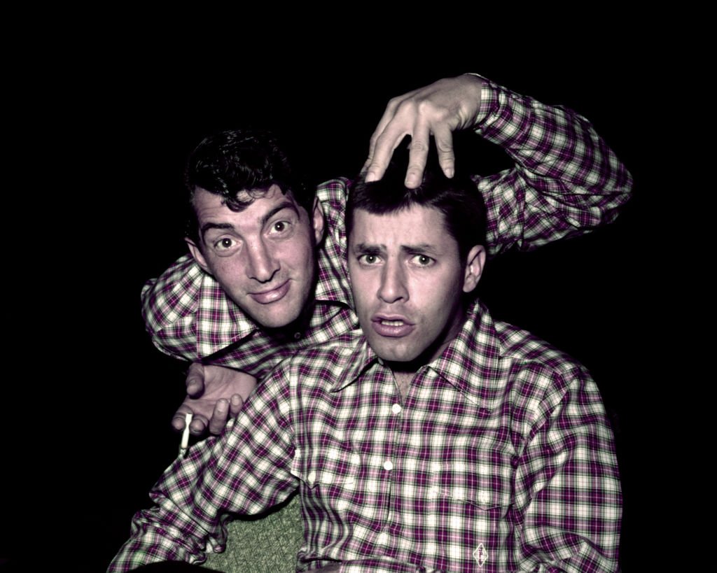Portrait of American actors Dean Martin (born Dino Crocetti, 1917 - 1995) and Jerry Lewis (born Jerome Levitch, 1926 - 2017), both in plaid shirts, late 1950s or early 1960s. | Source: Getty Images