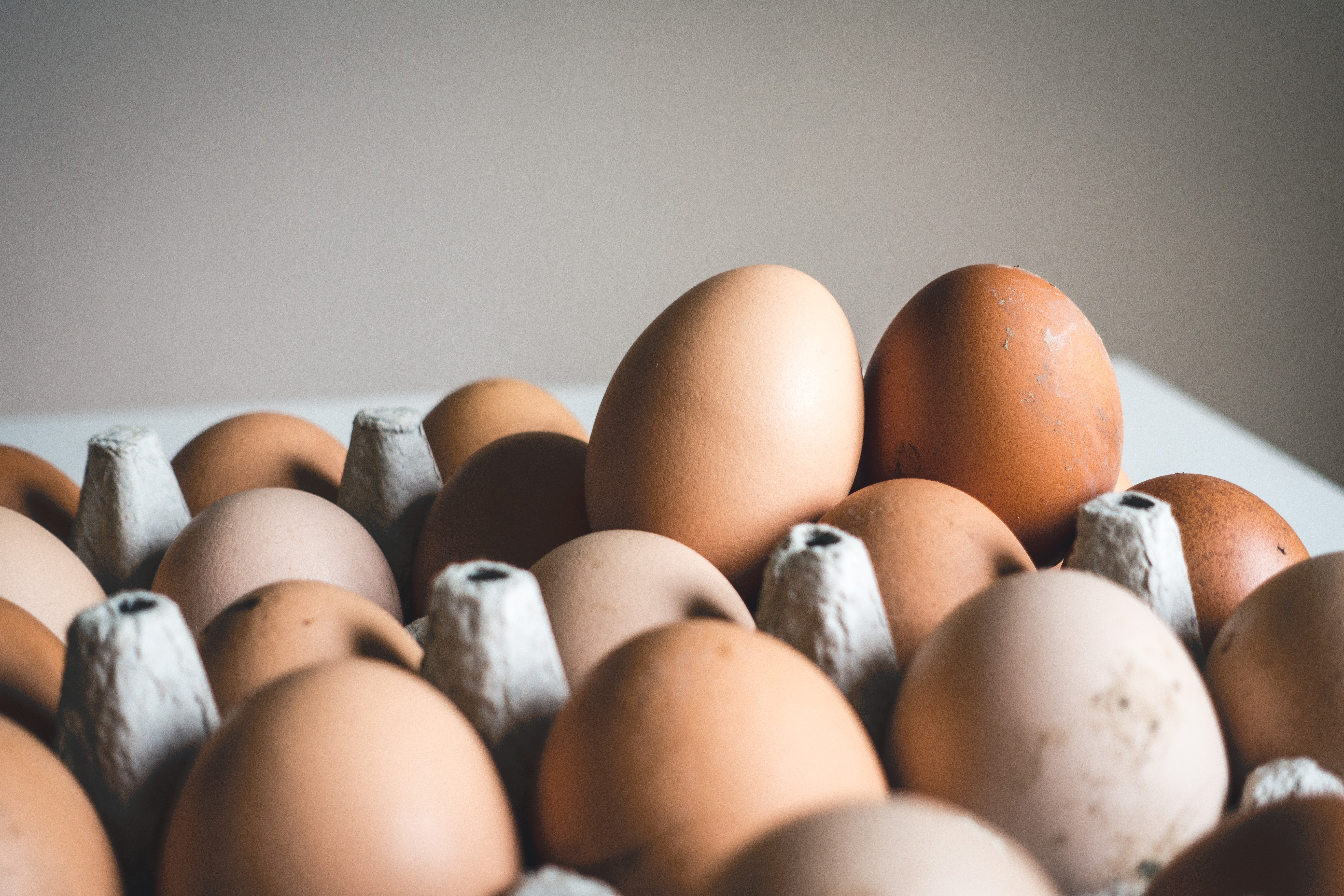 Two extra eggs in a crate | Source: Unsplash.com