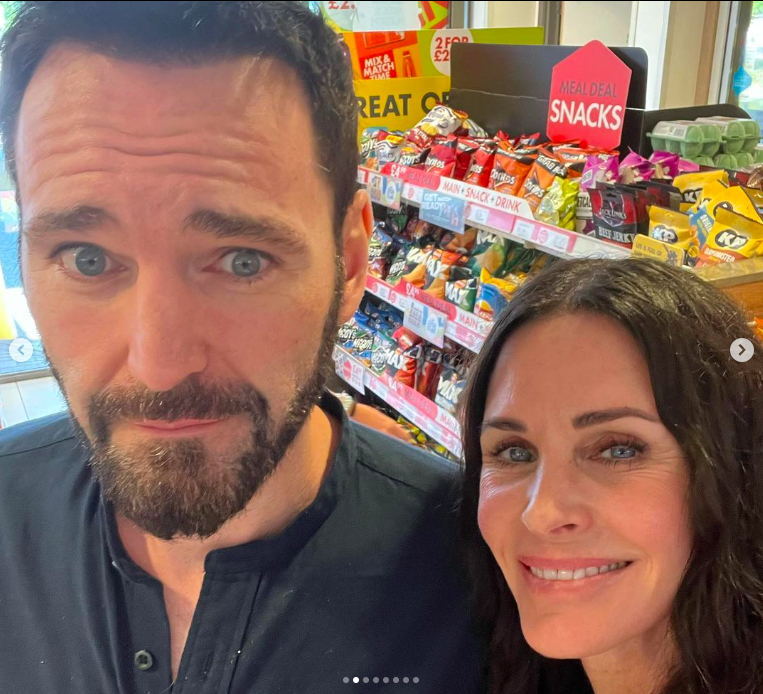 Johnny McDaid and Courteney Cox posing for a picture posted on July 25, 2022 | Source: Instagram/courteneycoxofficial