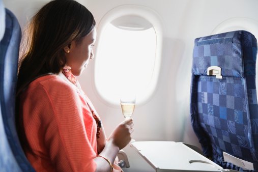 Woman on a flight | Photo: Getty Images