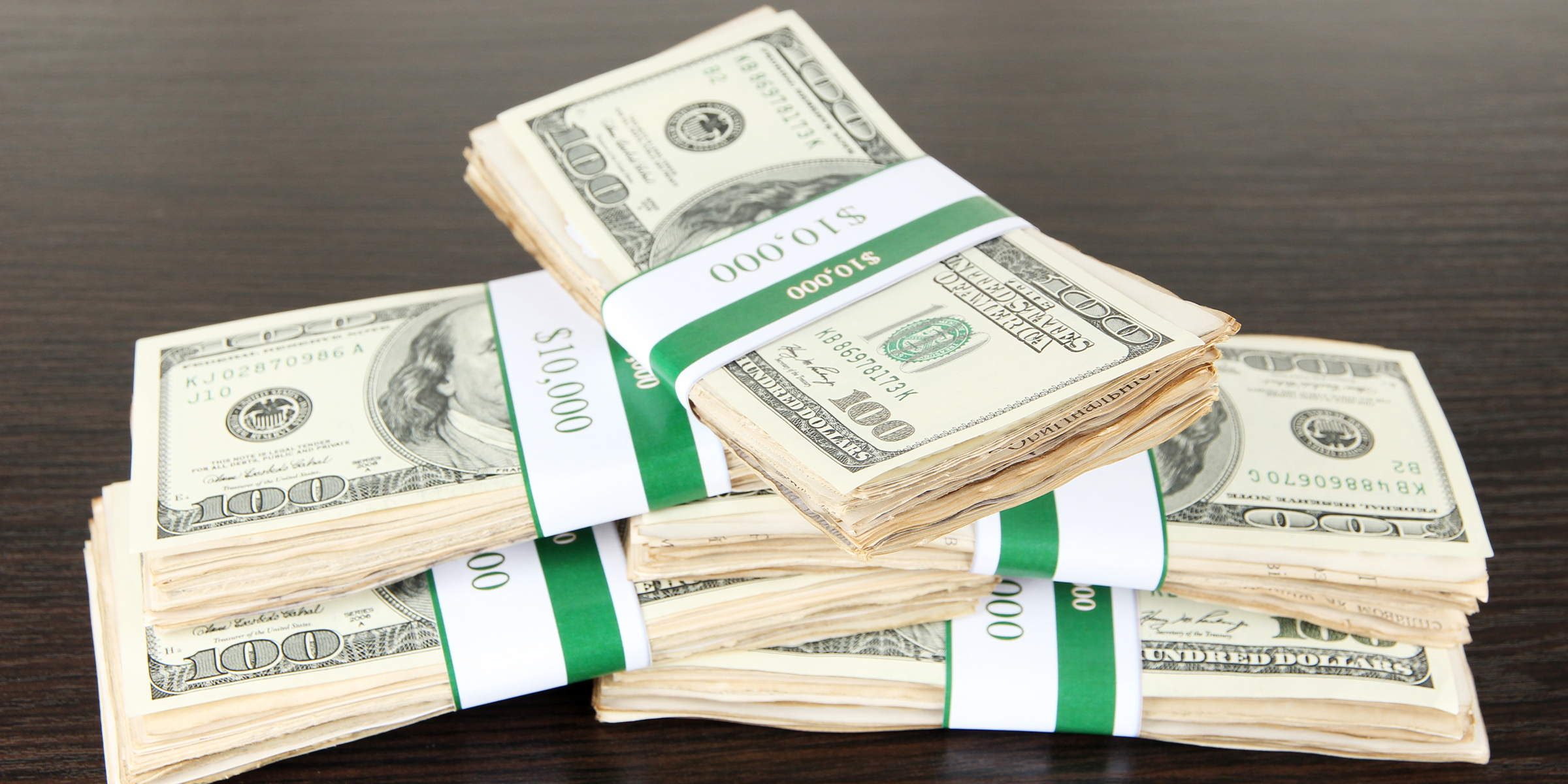Stacks of dollar bills | Source: Shutterstock