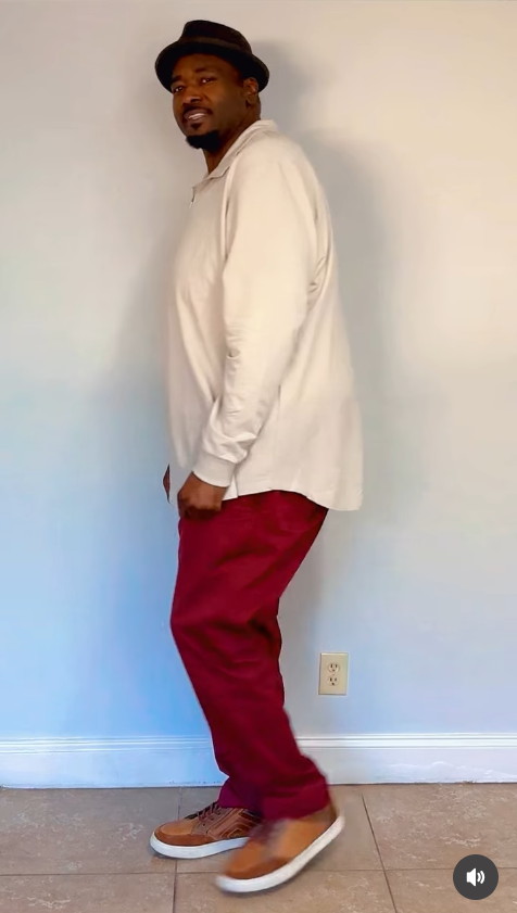 Quinton Aaron's casual stance and half-smile give the moment a relaxed, playful feel against the plain white wall. | Source: Instagram/officialquintonaaron