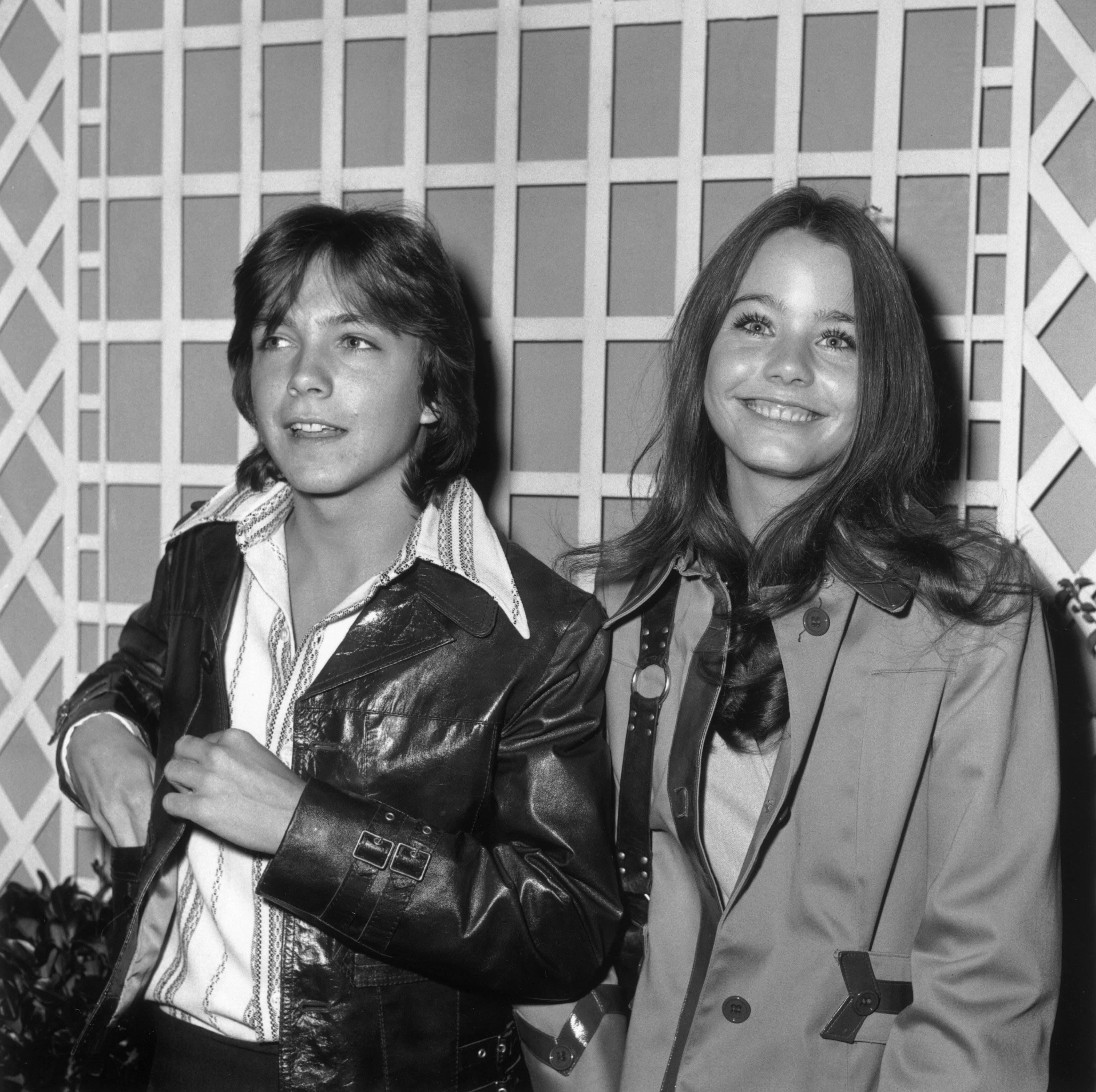 American actors David Cassidy and Susan Dey, costars of the television series 'The Partridge Family,' standing together and smiling while at an ABC party held at the Bistro. | Source: Getty Images