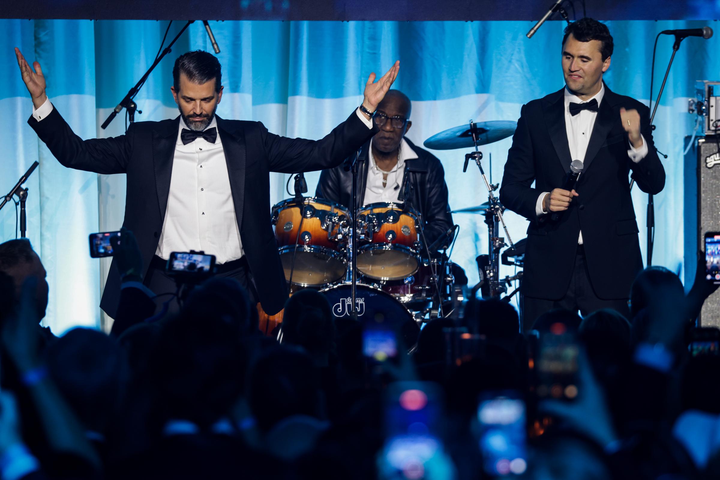 Donald Trump Jr. and Charlie Kirk on stage at the Inaugural-Eve Ball in Washington, D.C., on January 19, 2025. | Source: Getty Images