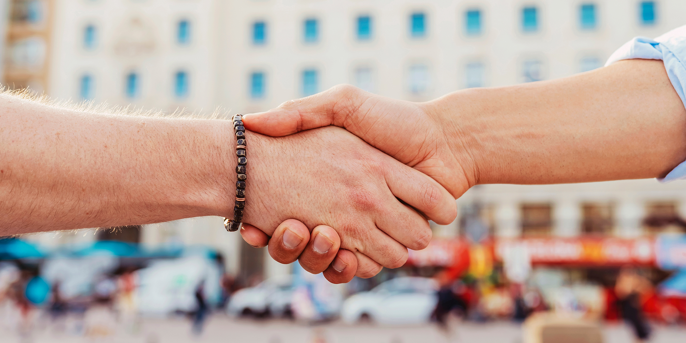 A friendly handshake | Source: Shutterstock