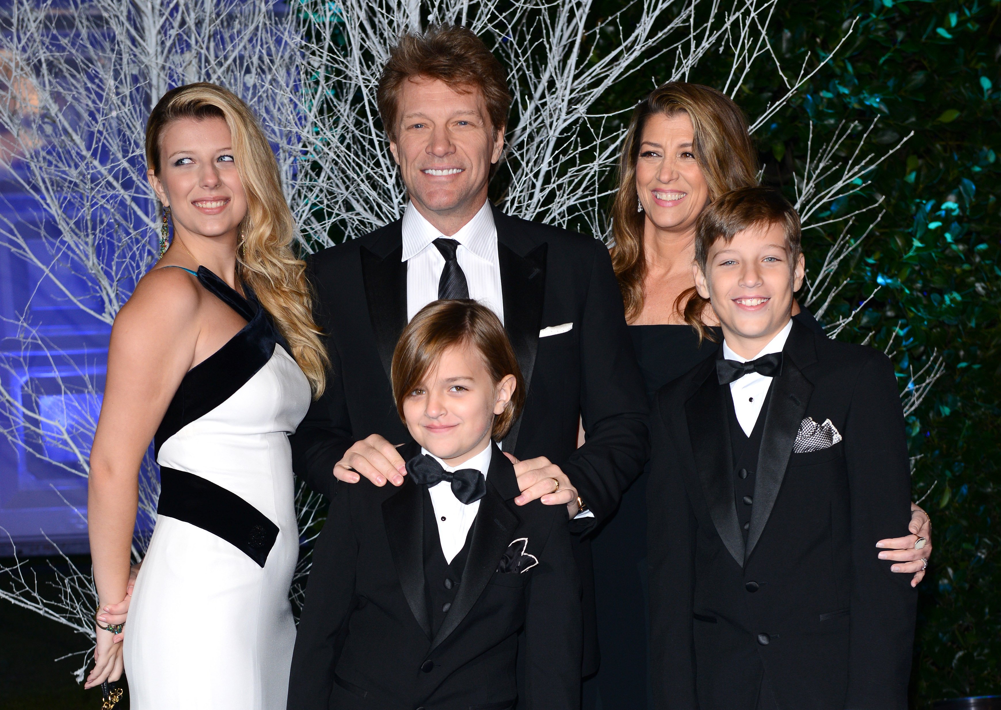 Stephanie Bongiovi, Jon Bon Jovi, Romeo Bongiovi, Dorothea Hurley and Jacob Bongiovi attend the Winter Whites Gala in aid of Centrepoint at Kensington Palace on November 26, 2013 in London, England ┃Source: Getty Images