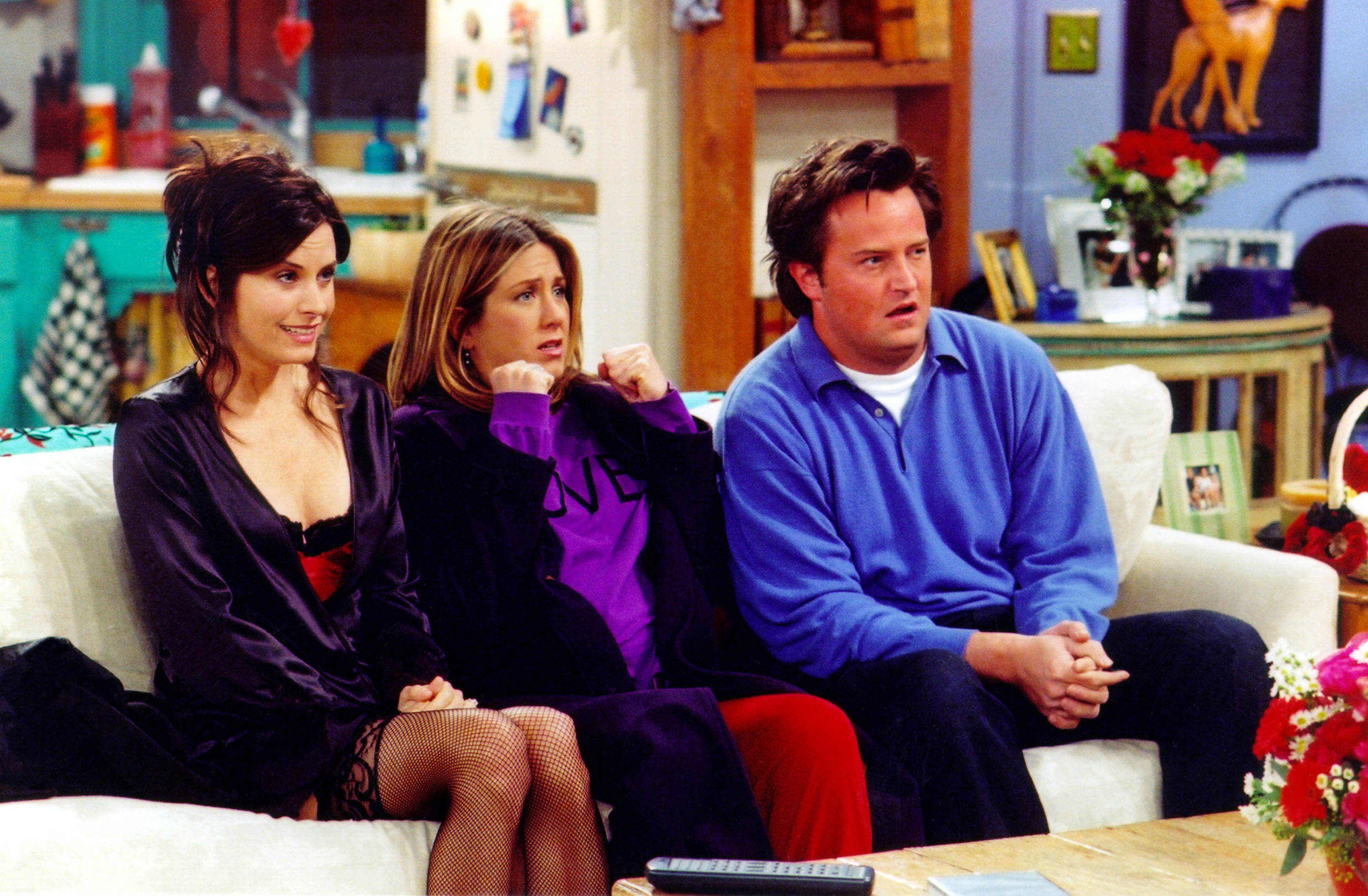 Courteney Cox Arquette, Jennifer Aniston, and Matthew Perry are shown in a scene from the NBC series "Friends" in New York City | Source: Getty Images