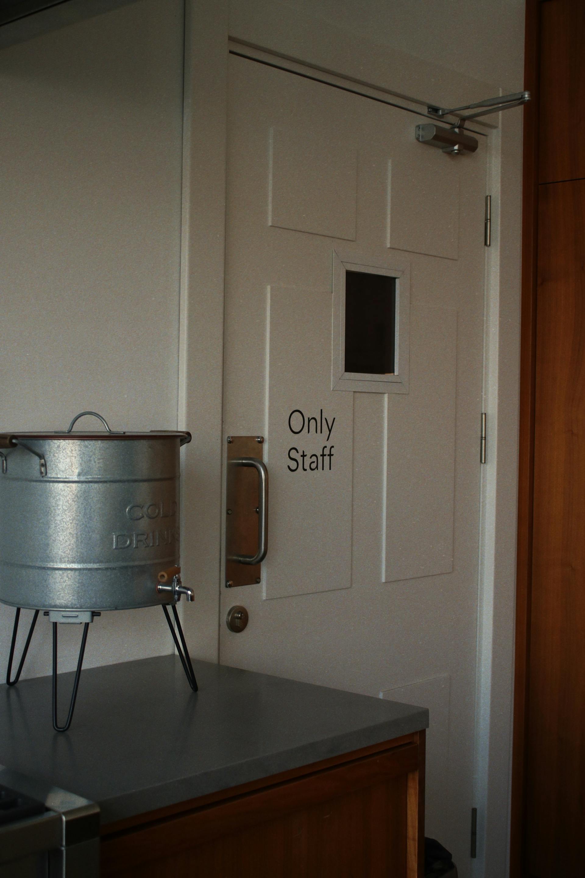 A staff entrance in a restaurant kitchen | Source: Pexels