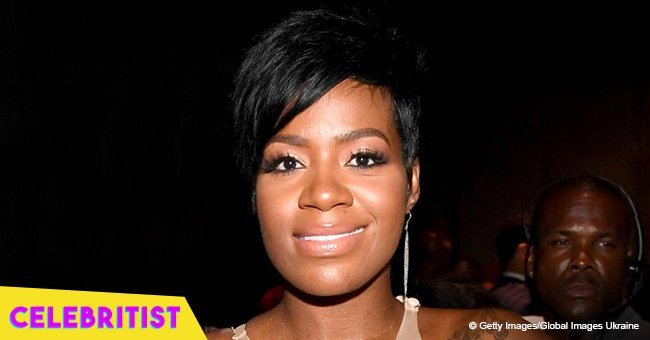 Fantasia's daughter looks all grown-up in jeans and black jacket in photo with young man