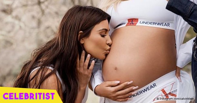 Khloé Kardashian flaunts 8-month baby bump in underwear alongside sisters  in Calvin Klein ad pic