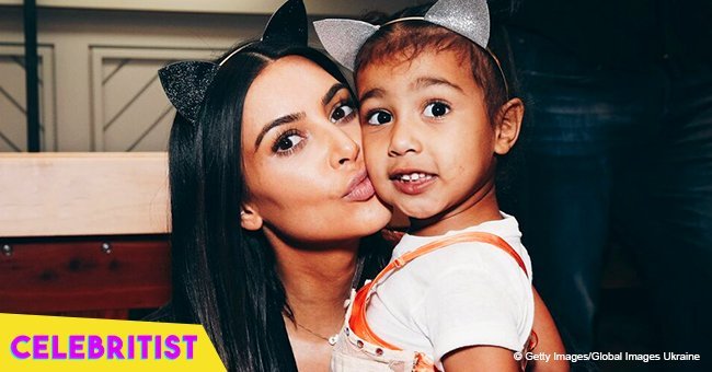 Kim Kardashian sparks controversy & gets slammed for straightening North's naturally curly hair