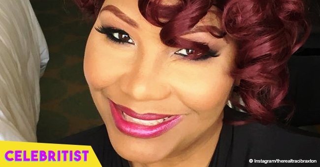 Traci Braxton, 46, turns heads in backless black dress in recent pic