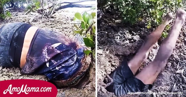 Video captures man diving into a hole. Friend screams after seeing the crab he got out