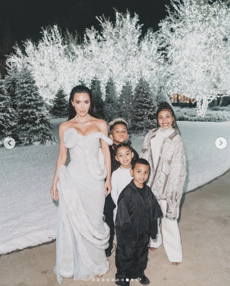 Kim Kardashian is pictured with all four of her kids during Christmastime, in a photo shared on December 27, 2023 | Source: Instagram/kimkardashian