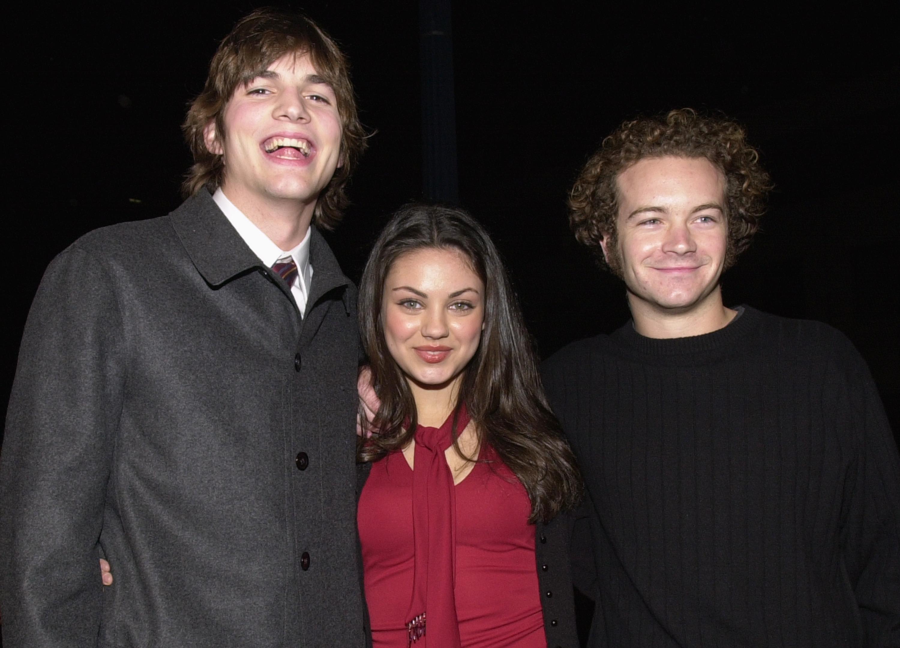 Ashton Kutcher, Mila Kunis, and Danny Masterson at the premiere of USA Films' "Traffic" on December 14, 2000 in Beverly Hills. | Source: Getty Images