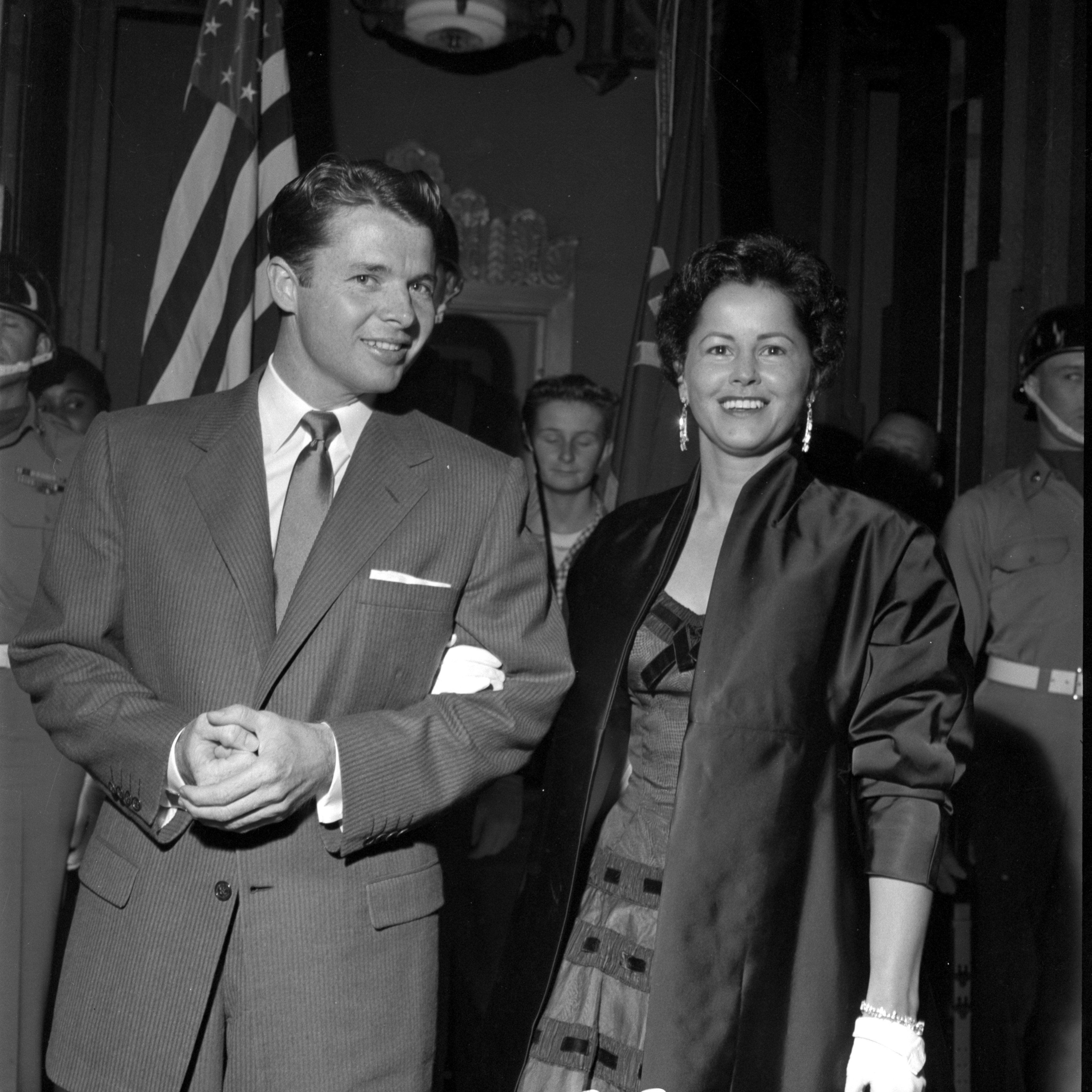 Audie Murphy and wife Pamela Archer attend the movie premiere "Back From Hell" on October 11, 1955 in Los Angeles, California | Source: Getty Images