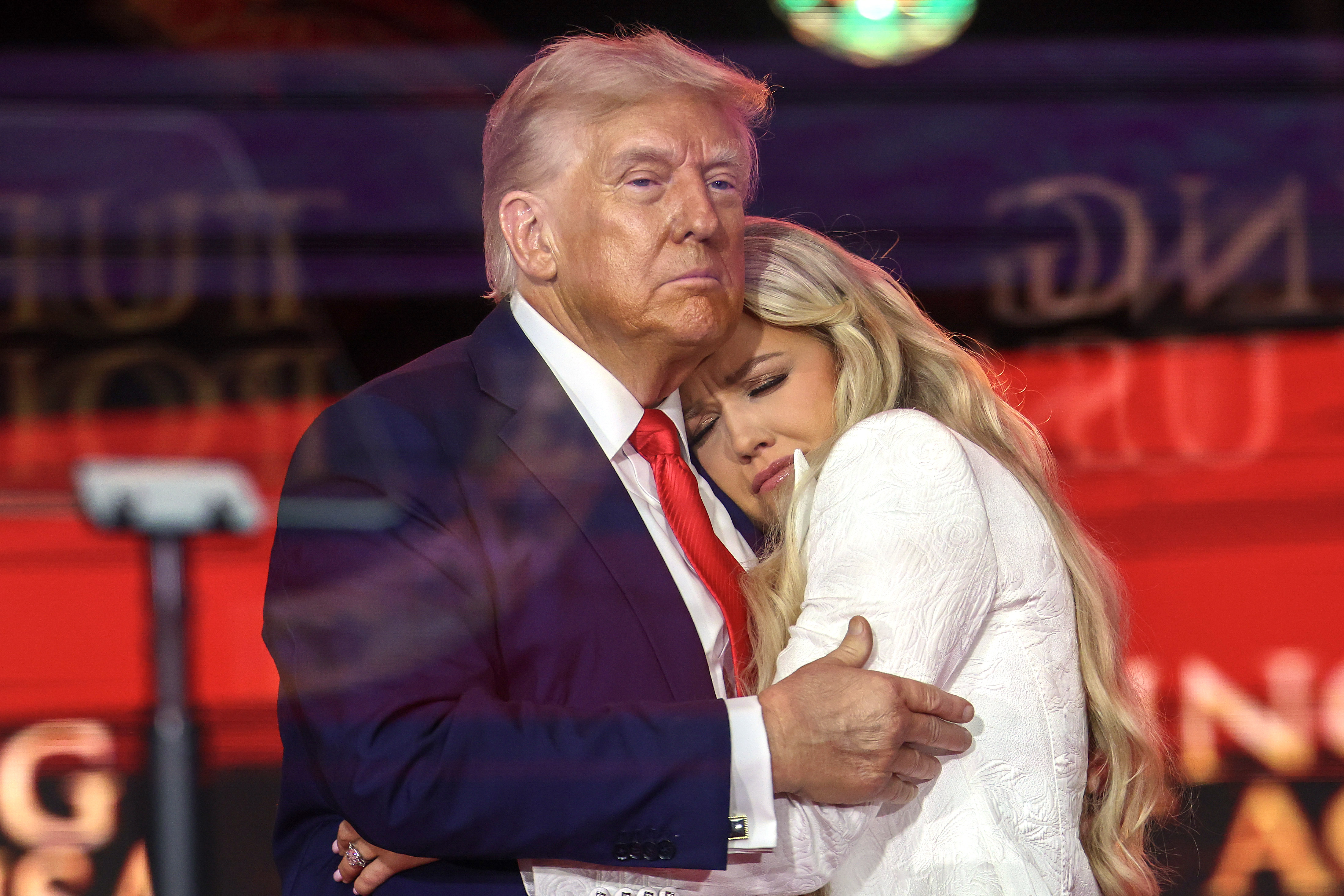 Donald Trump and Erika Kirk sharing an embrace. | Source: Getty Images