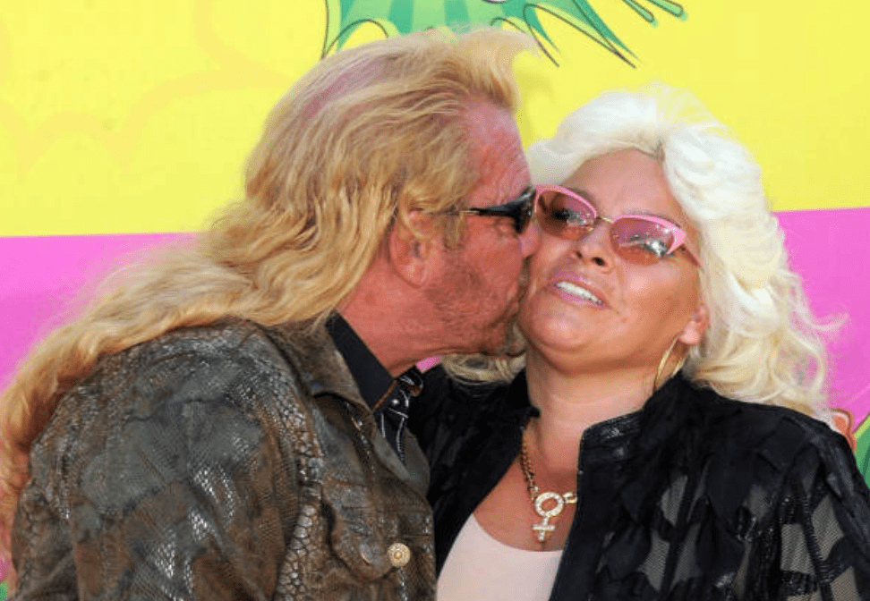 Duane "Dog" Chapman kisses his wife Beth Chapman, as they arrived at Nickelodeon's 26th Annual Kids' Choice Awards, in Los Angeles, USA, on 23 March 2013 | Photo: Getty Images