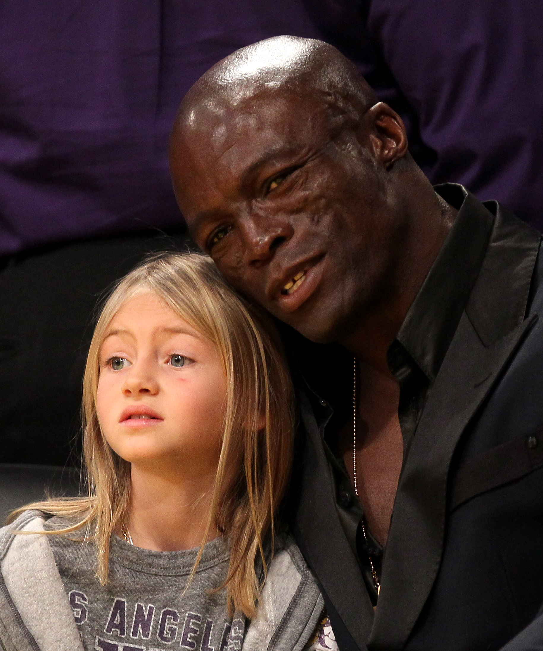 Seal and daughter Leni Samuel attend the game between the Boston Celtics and the Los Angeles Lakers at Staples Center on March 11, 2012 in Los Angeles, California | Source: Getty Images