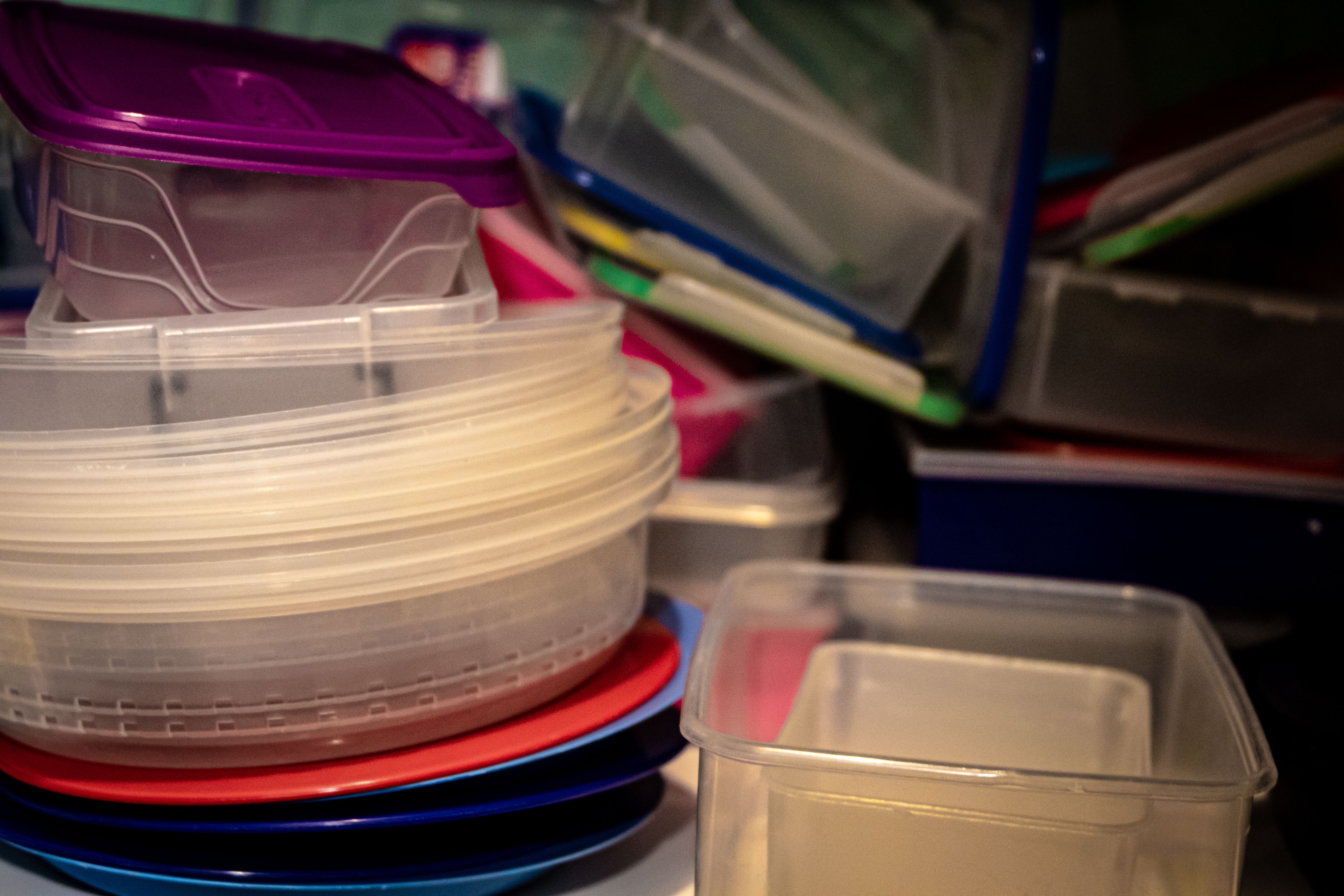 Piles of plastic containers | Source: Pexels