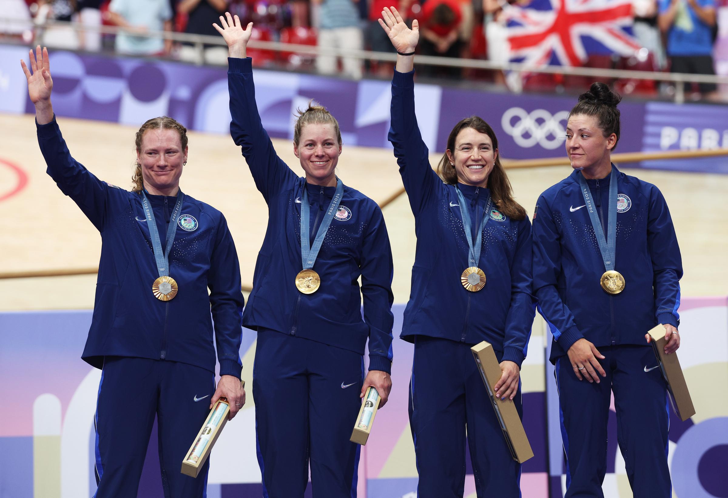 Jennifer Valente, Lily Williams, Chloé Dygert and Kristen Faulkner posing with their gold medals after the Women's Team Pursuit during the Paris Olympics in Paris, France on August 7, 2024 | Source: Getty Images