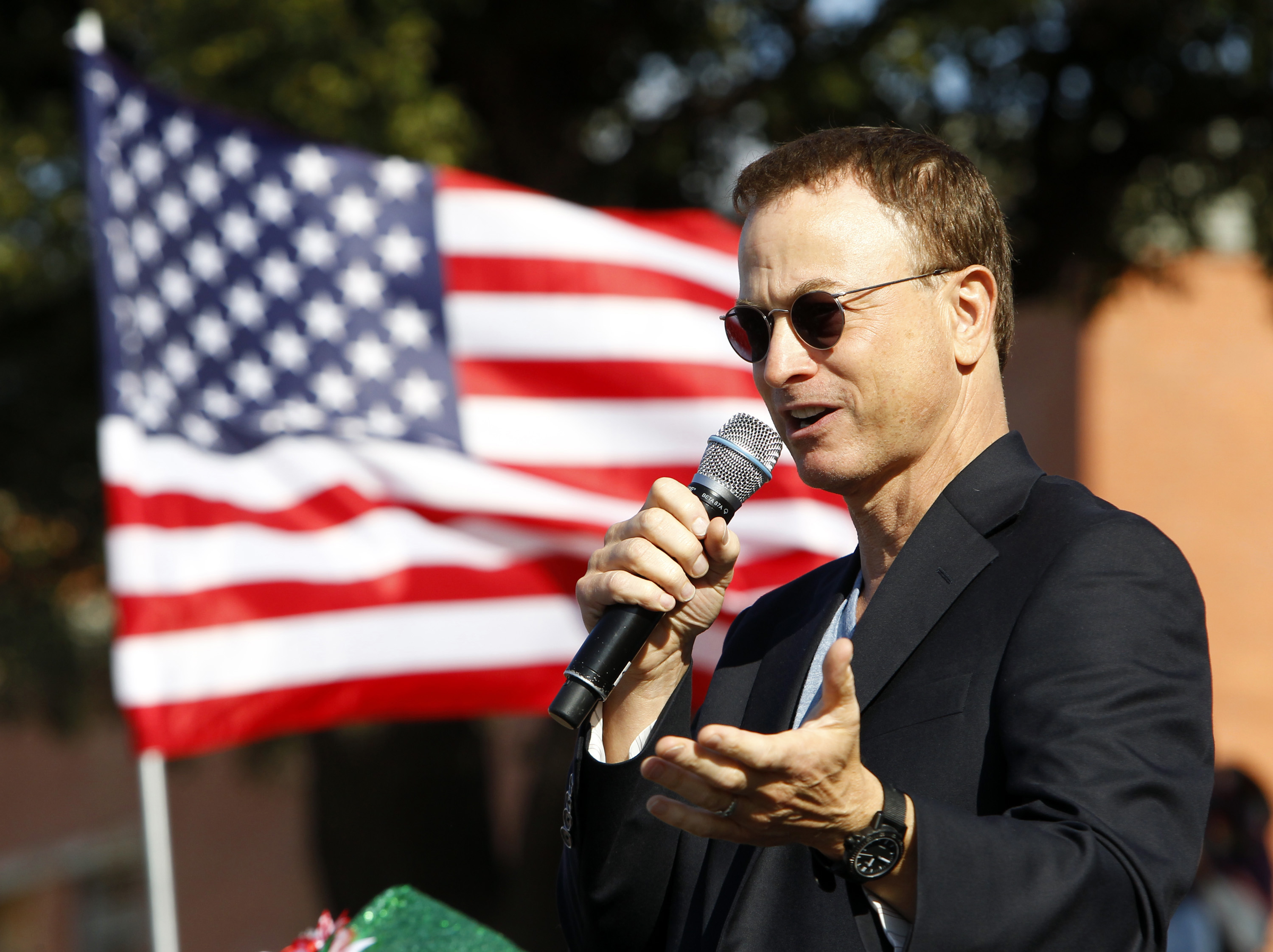 Gary Sinise speaks to the crowd at the Snowball Express event in the Stockyards Sunday, December 2, 2012, in Fort Worth, Texas. His band, the Lt. Dan Band, performed later that day for the crowd at Billy Bob's Texas | Source: Getty Images
