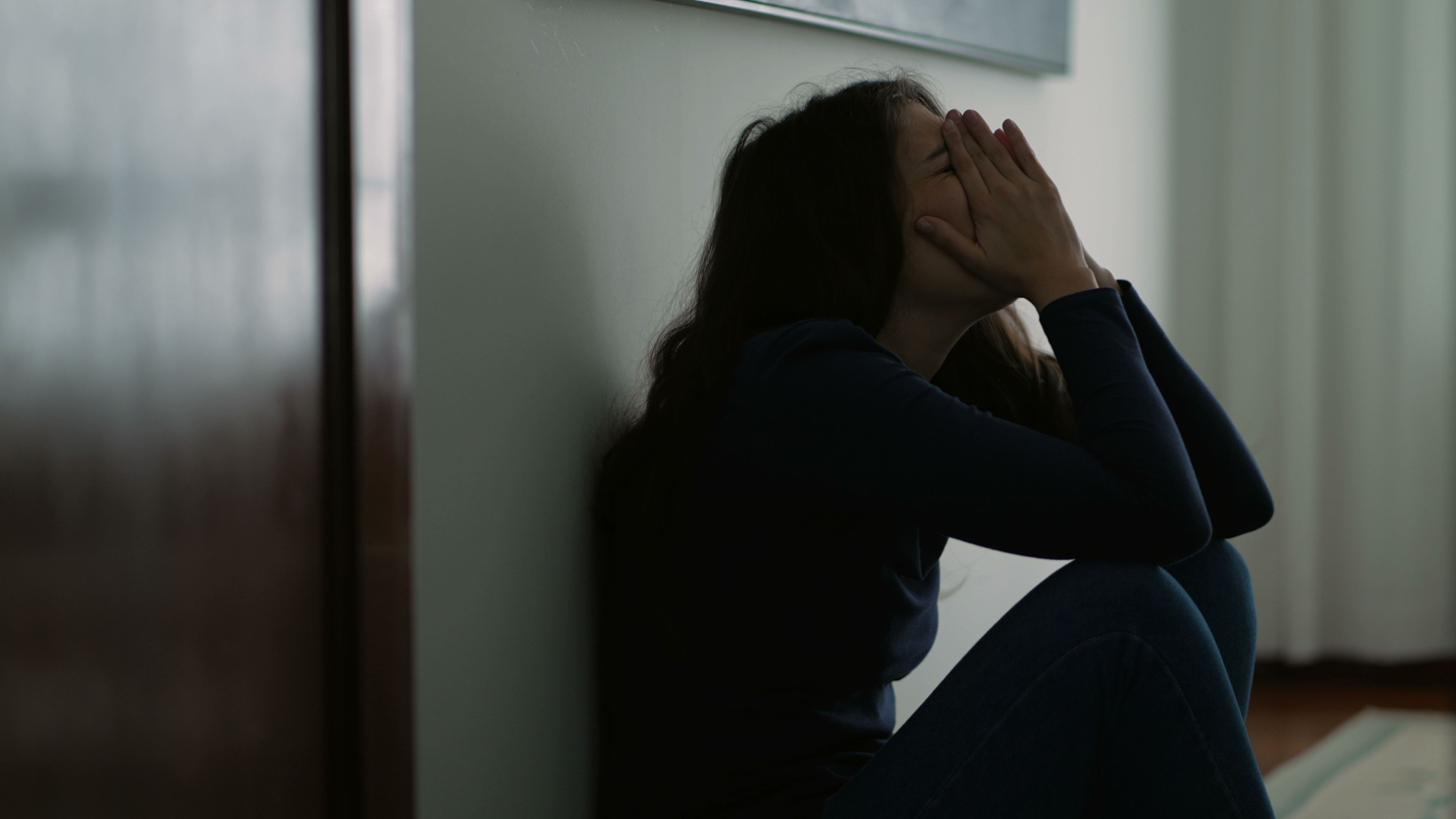 Woman feeling emotional pain | Source: Shutterstock