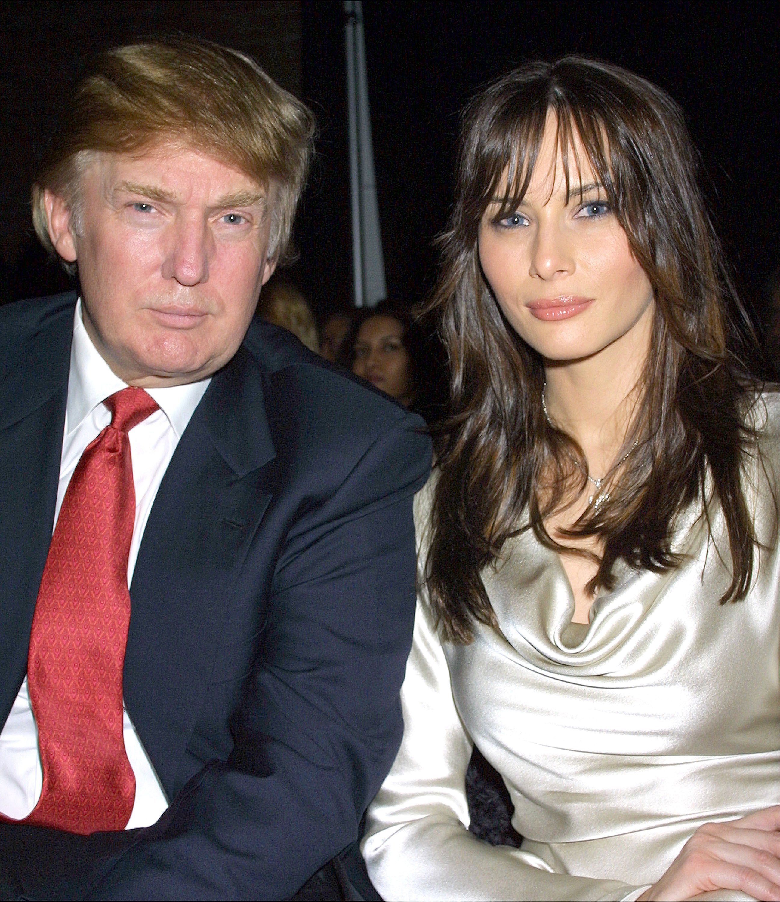 Donald Trump and his girlfriend Melania Knauss attend the Marc Bouwer/Peta Fall/Winter 2002 Collection show February 14, 2002 | Photo: GettyImages