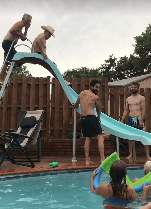 Roy Beller ready to make his way down the waterslide. | Photo: Facebook/MichaelandMichelle Graham