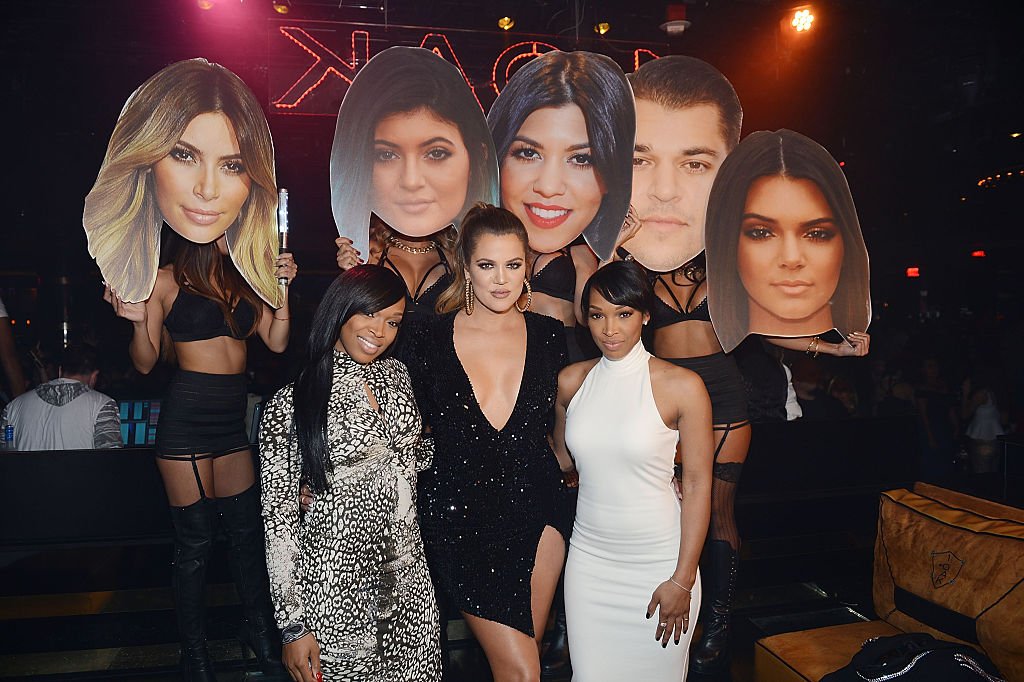 Khadijah Haqq, Khloe Kardashian and Malika Haqq pose with cut out faces at 1 OAK Nightclub on December 30, 2014, in Las Vegas, Nevada |Source: Getty Images (Photo by Denise Truscello/WireImage)