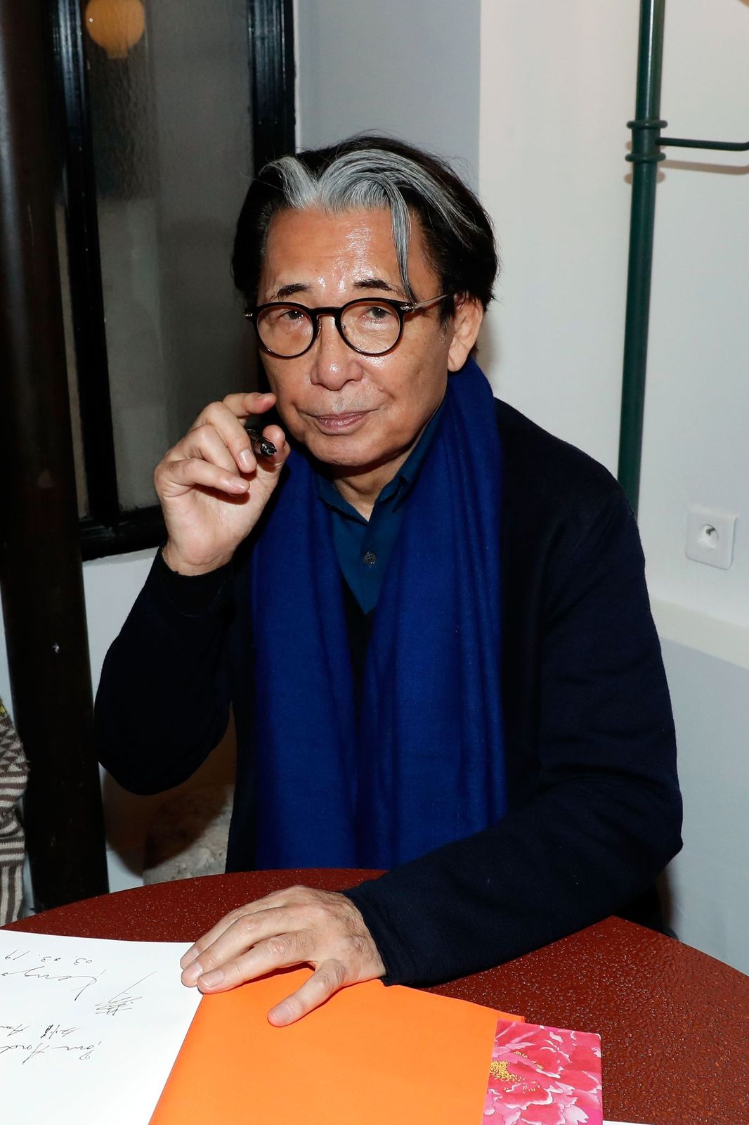 Kenzo Takada at a book signing as part of the Paris Fashion Week Womenswear Fall/Winter 2019/2020 on March 02, 2019, in Paris, France | Photo: Bertrand Rindoff Petroff/Getty Images