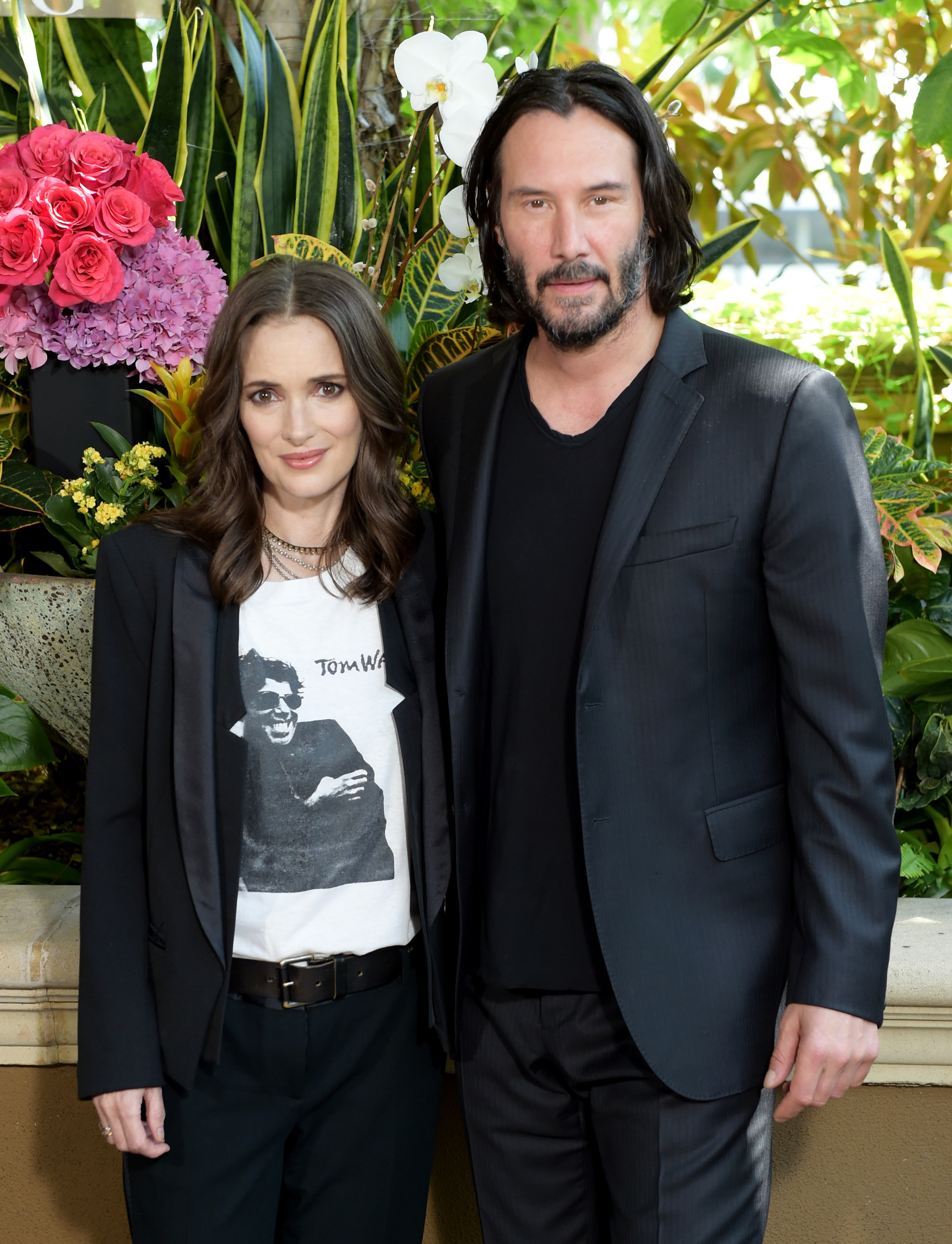 Winona Ryder and Keanu Reeves at the "Destination Wedding" photo call in Los Angeles, 2018 | Source: Getty Images