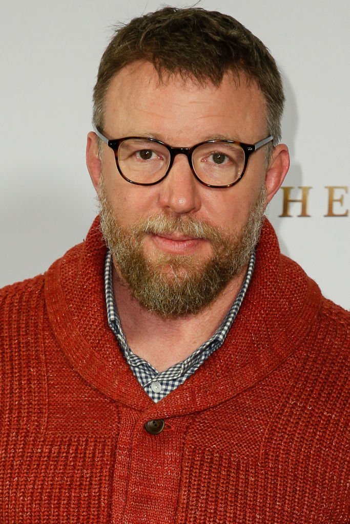 Guy Ritchie comes to the photocall of the movie "The Gentlemen" at the cinema Zoo Palast on 11 February 2020 | Photo: Getty Images