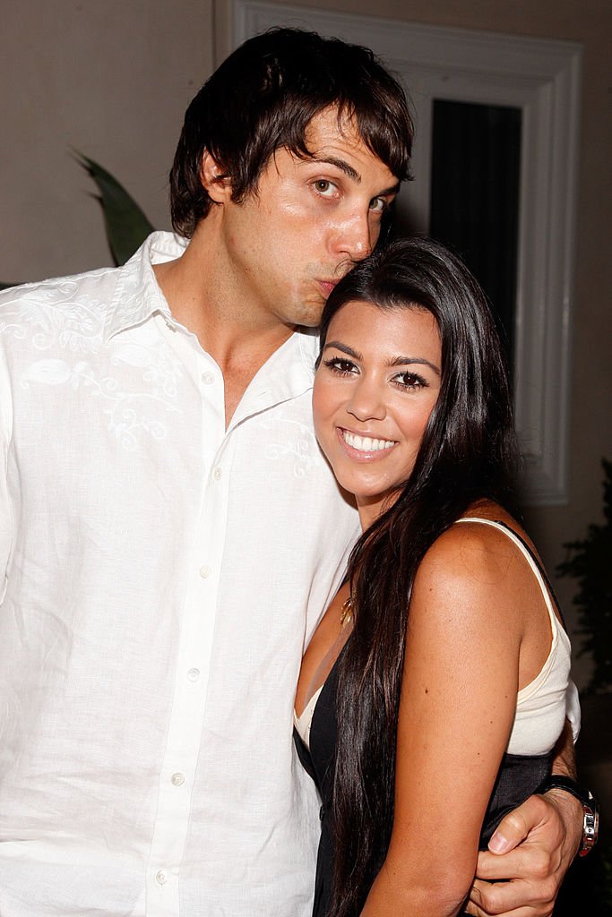 Kourtney Kardashian and Joe Francis arrive at the launch of the new Op Advertising Campaign Party, June 2008 | Source: Getty Images