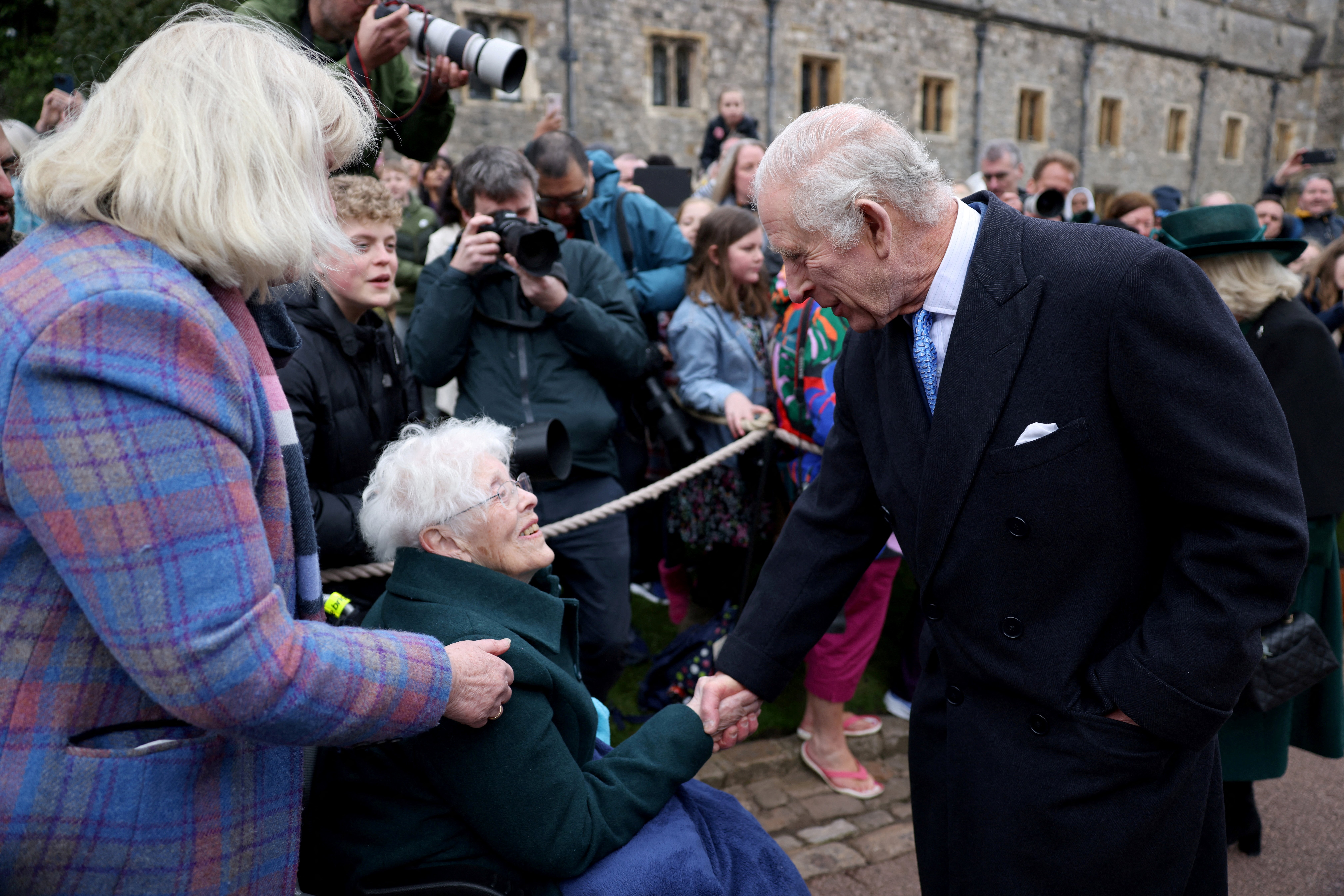 King Charles greeting well-wishers as he leaves St. George's Chapel after attending the Easter Matins Service on March 31, 2024 | Source: Getty Images