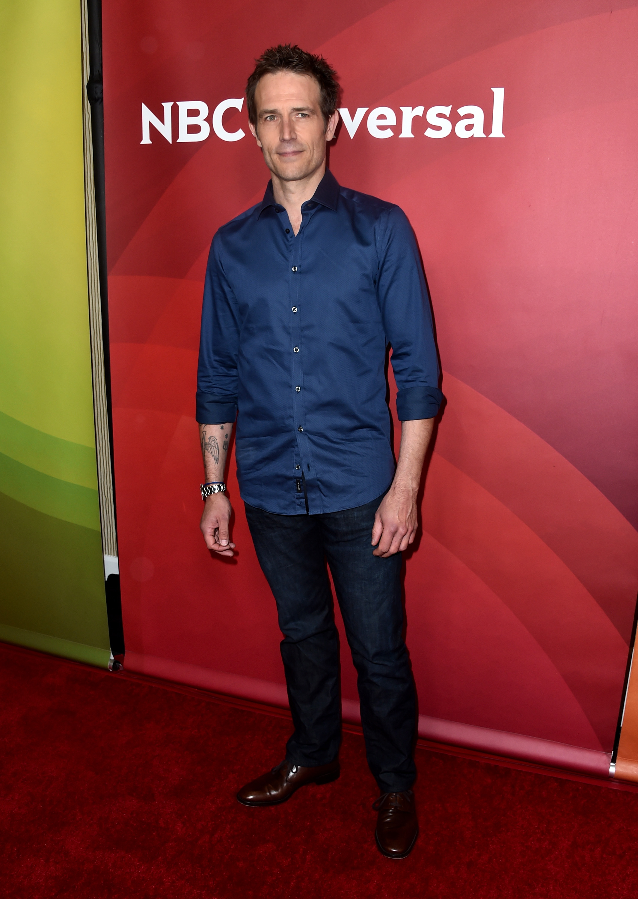 Michael Vartan steps out at the NBC Universal Summer Press Day, promoting his role in "The Arrangement." In a fitted navy button-down, he exudes confidence.