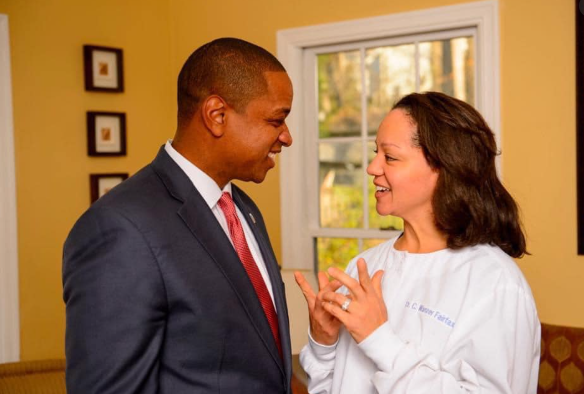 Justin and Cerina Fairfax speak inside their home in an undated photo | Source: Facebook/justin.fairfax.2025