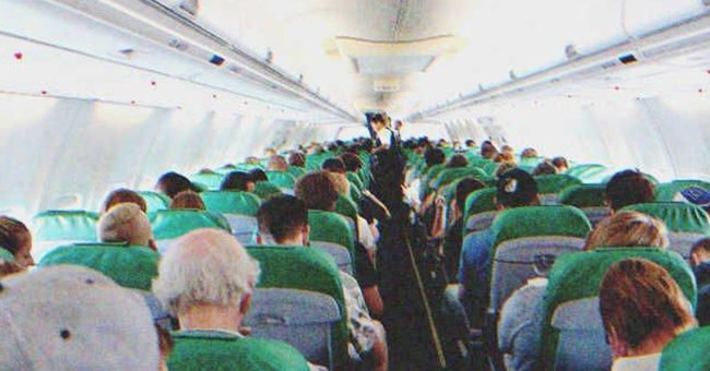 A plane full of passengers | Source: Shutterstock