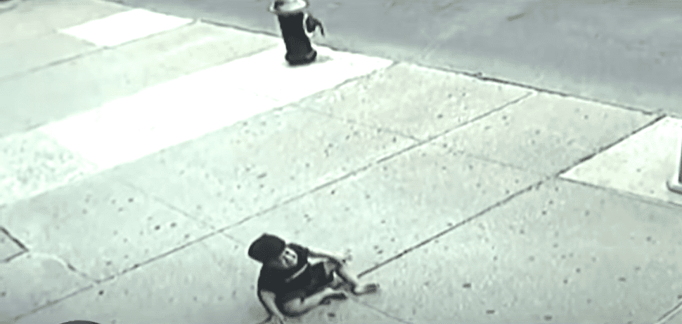 Surveillance video from a Bronx store shows Jose Garcia on the ground | Photo: YouTube/CBS New York