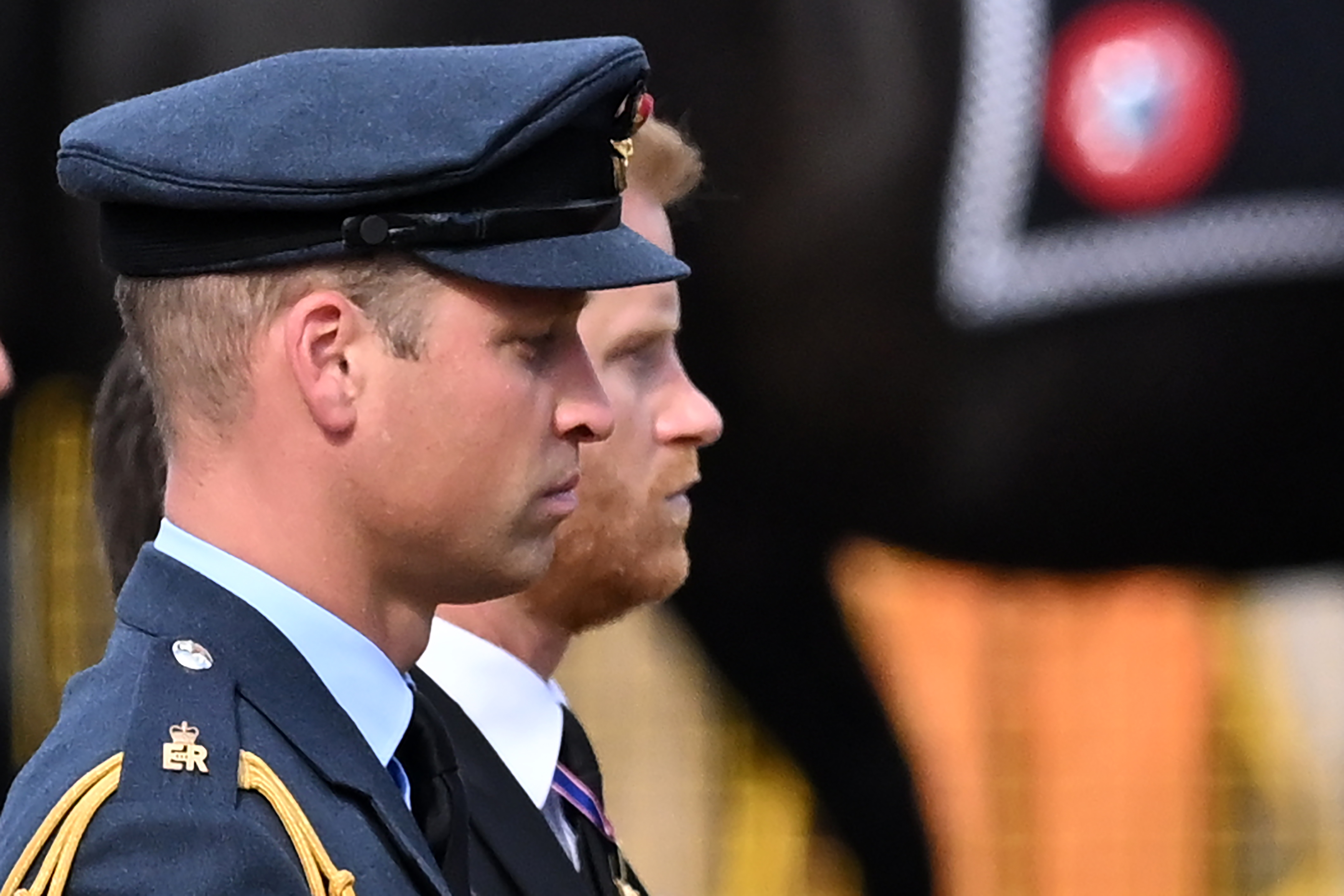 Prince William and Prince Harry walking behind the late Queen Elizabeth II's coffin in London, England on September 14, 2022 | Source: Getty Images