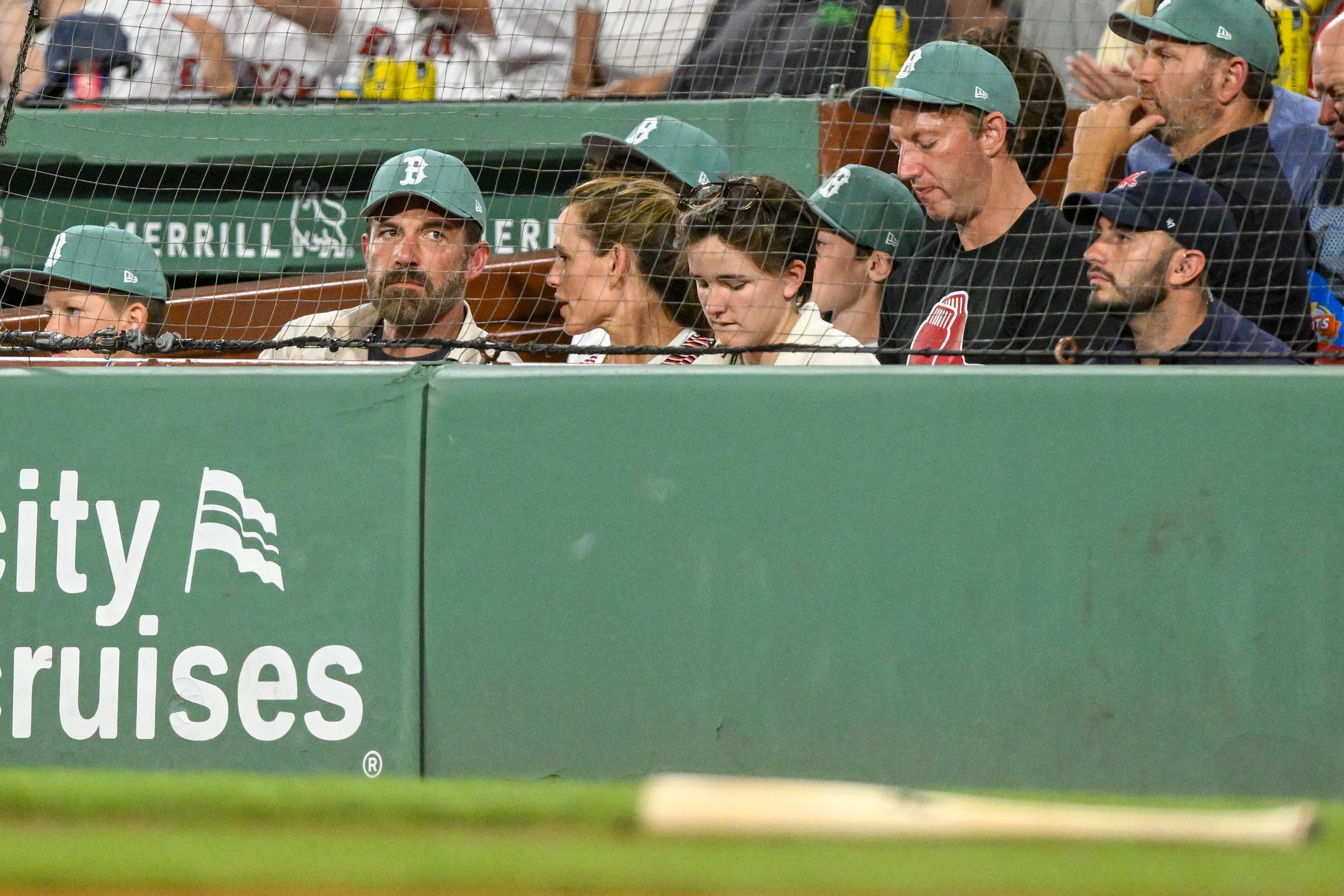 Ben Affleck and Jennifer Garner watch a game with their children, Fin and Samuel, during the fourth inning between the Boston Red Sox and the Tampa Bay Rays at Fenway Park on July 11, 2025, in Massachusetts | Source: Getty Images
