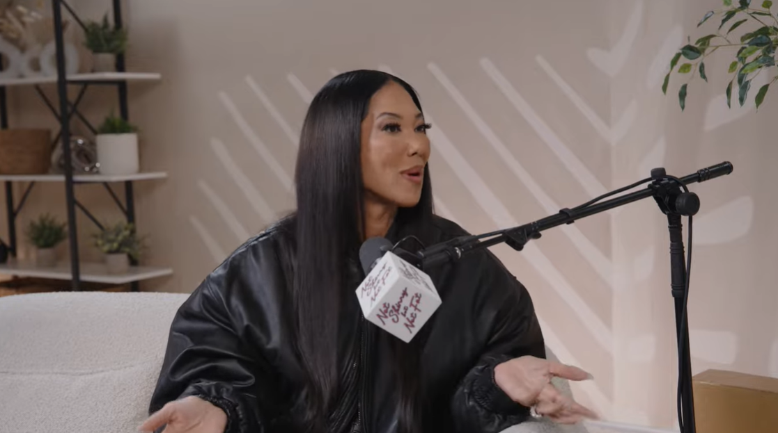 Kimora Lee Simmons reacts with disbelief as she explains that she had no idea her daughter was in the relationship until it became public | Source: YouTube/notskinnybutnotfat