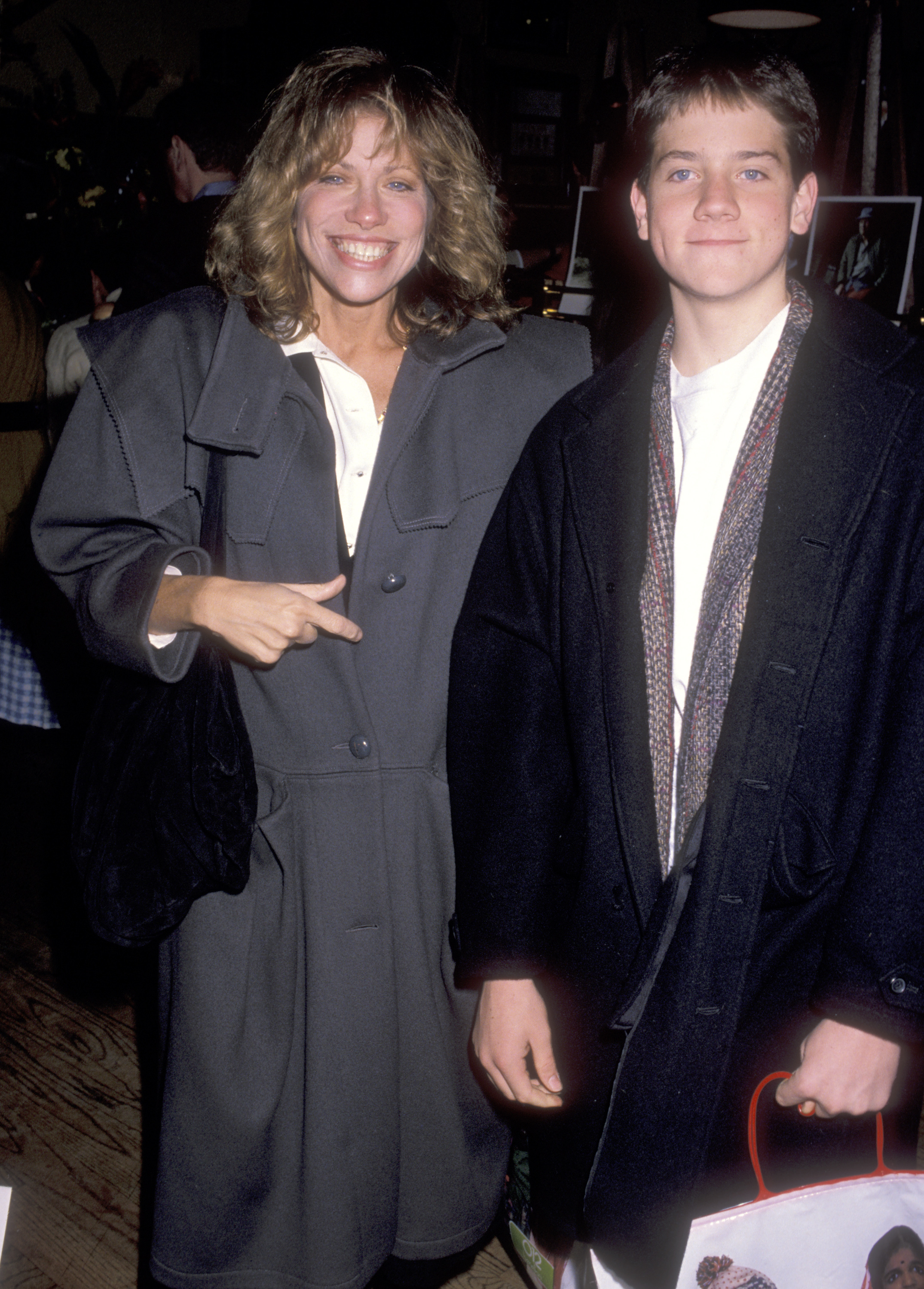 Musician Carly Simon and son Ben Taylor attend the "Danny the Champion of the World" New York City premiere party on November 18, 1989, at Hard Rock Cafe in New York City. | Source: Getty Images
