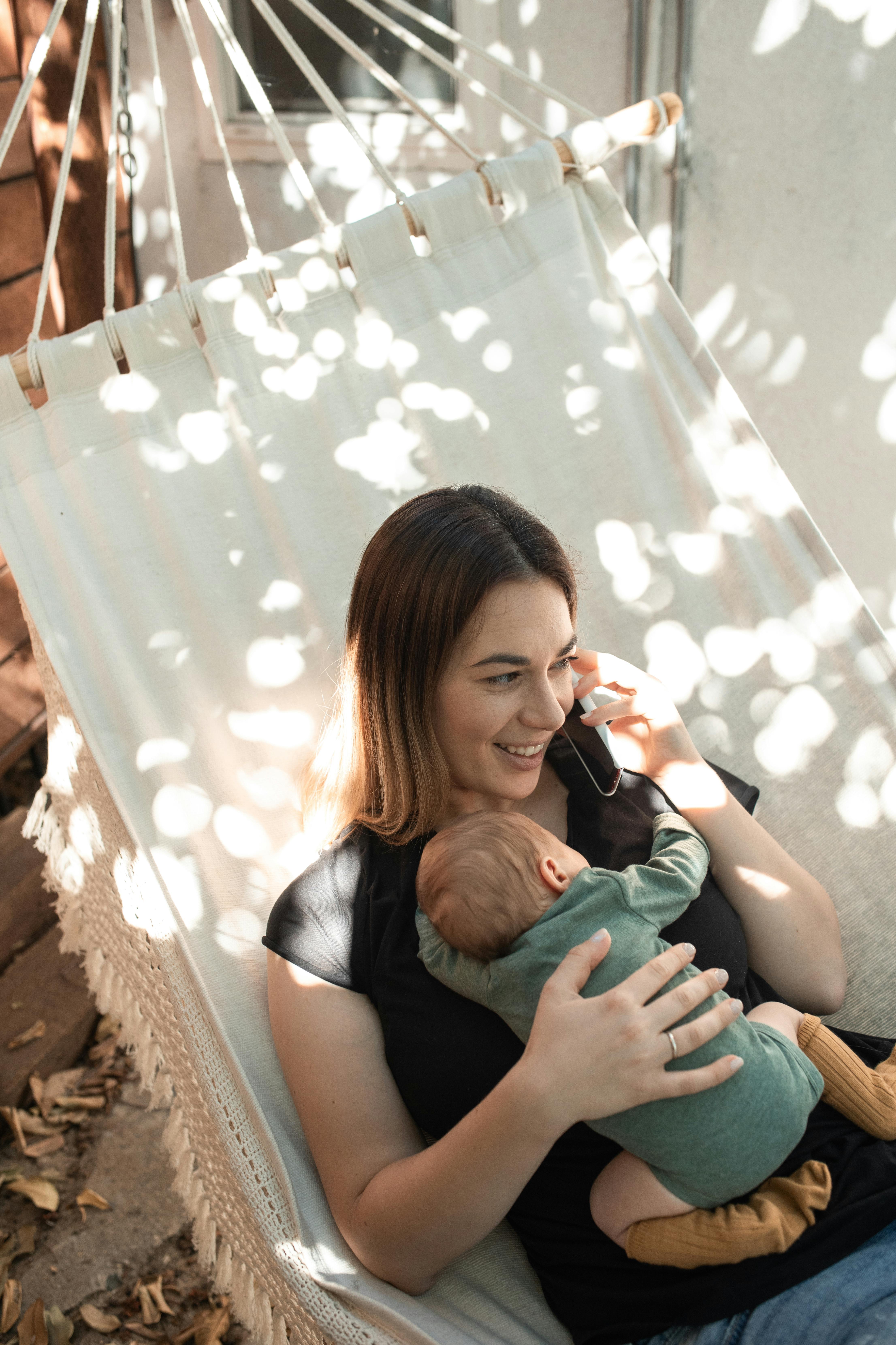 A happy woman with her baby | Source: Pexels