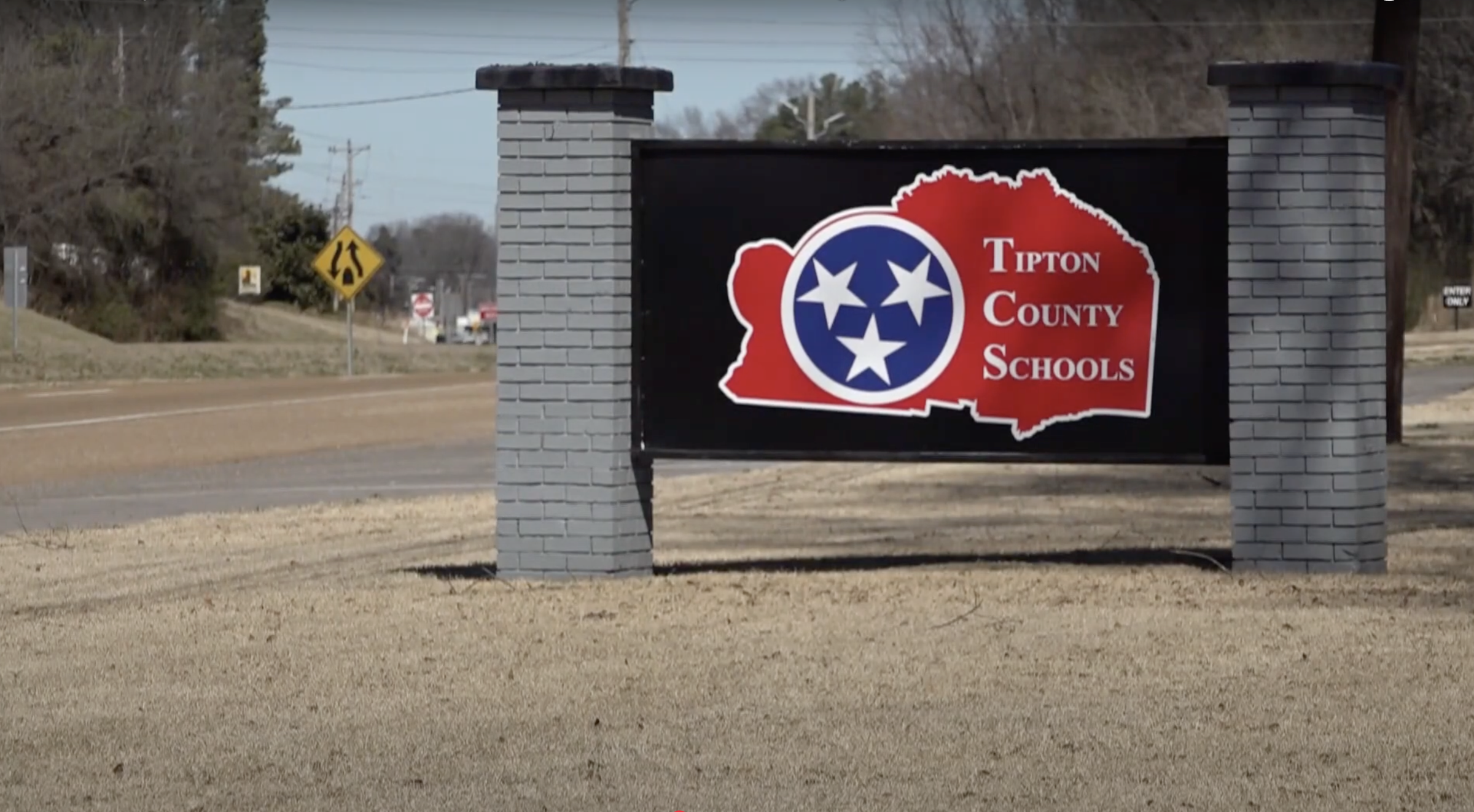 The exterior of Tipton County Schools, as seen in a video dated March 7, 2025 | Source: YouTube/ABC24Memphis