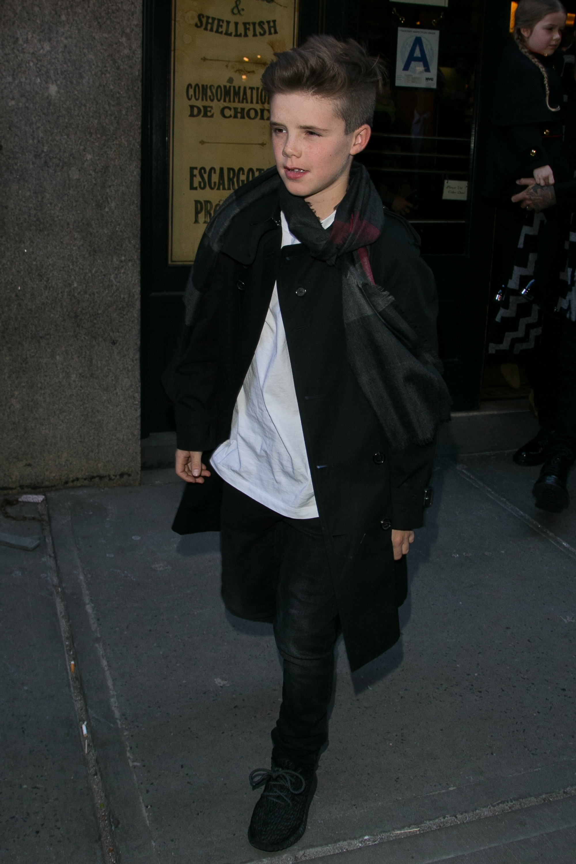 Cruz Beckham leaves the Balthazar restaurant in New York City on February 14, 2016 | Source: Getty Images