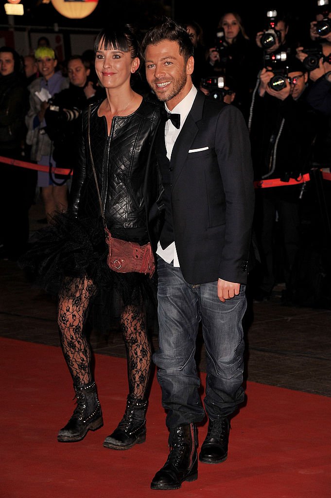 Christophe Maé et Nadège Sarron assistent aux NRJ Music Awards 2011 le 22 janvier 2011 au Palais des Festivals et des Congrès à Cannes. | Photo : Getty Images